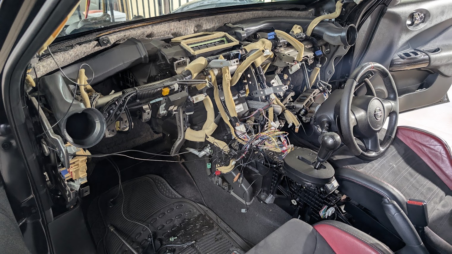 Vehicle interior disassembled for air-conditioning repair