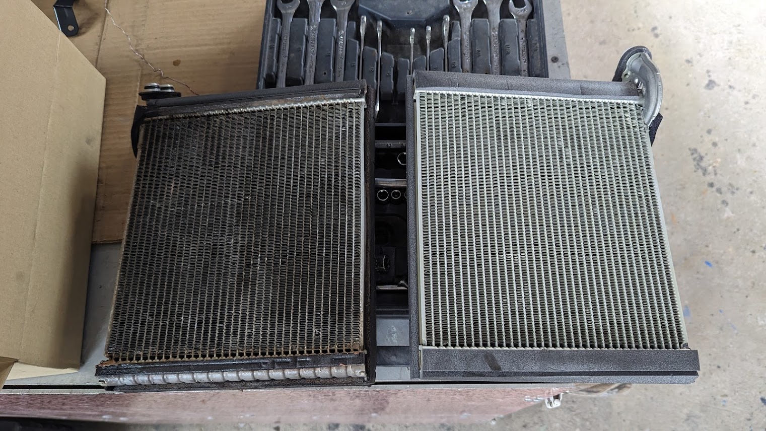 Automotive evaporator components before and after cleaning